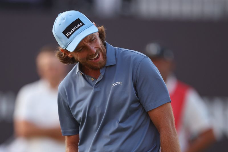 Jul 17, 2026; Southport, ENG; Tommy Fleetwood reacts after missing a putt on the 18th green during the second round of The Open Championship golf tournament at Royal Birkdale. Mandatory Credit: Bill Streicher-Imagn Images