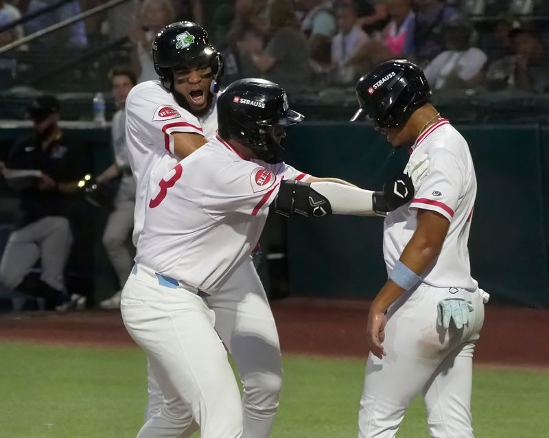 Daytona Tortugas teammates celebrate a grand slam by Ty Doucette (23) during a 14-11 victory against the Jupiter Hammerheads on July 18, 2026, at Jackie Robinson Ballpark.