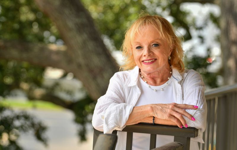 Karin Morel, outside of her Merritt Island home. She has decided to talk publicly about a sexual assault that she said happened to her more than two decades ago. She wants to help others by sharing her story.