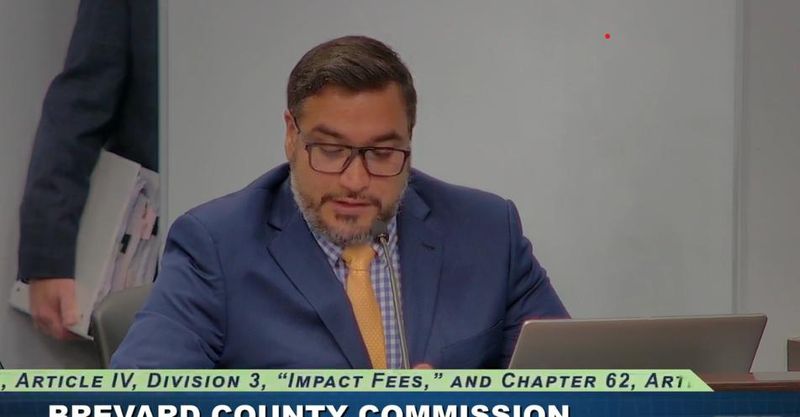 Planning and Development director Billy Prasad speaks at July 21, 2026 Brevard County Commission meeting on potential impact fee hikes.