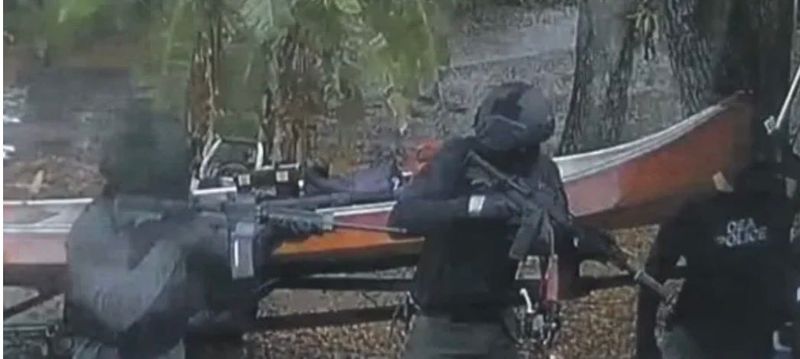 Video surveillance still photos show several masked men in military-tactical gear carrying out a botched home invasion that led to the March 3, 2021, shooting death of 25-year-old Merritt Island resident Matthew Nicols and his dog.