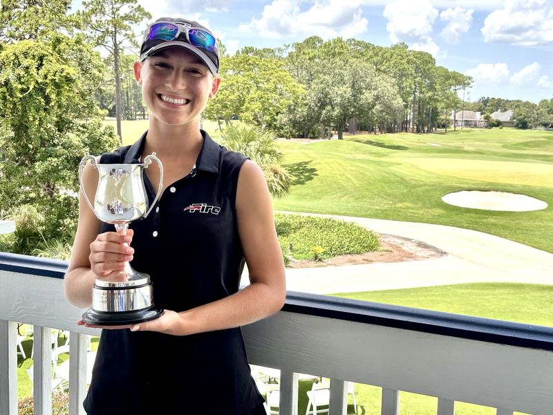 Sadaly Campbell of Fernandina Beach displays her trophy for winning the First Coast Women's Amateur on July 22 at the Jacksonville Golf and Country Club.