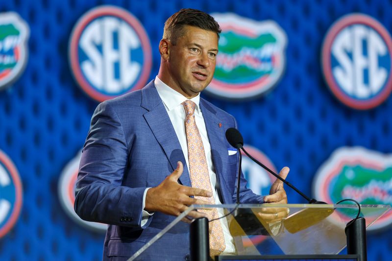 Jul 22, 2026; Tampa, FL, USA; Florida Gators head coach Jon Sumrall speaks to the press during SEC Football Kickoff Media Day at the Tampa Marriott. Mandatory Credit: Nathan Ray Seebeck-Imagn Images