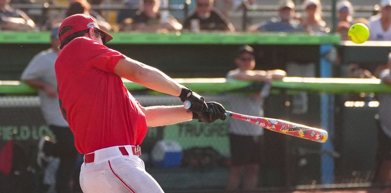 Volusia County Fire Rescue's Branton Strickland (8) hits the ball during a charity softball game against the Volusia Sheriff's Office at Jackie Robinson Ballpark on July 22, 2026.