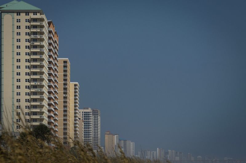 Condos near the Thomas Donuts entrance in Panama City Beach, Florida, July 23, 2026. (Tyler Orsburn/Panama City News Herald)