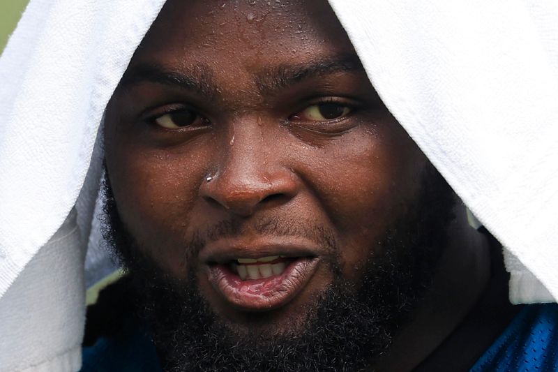Jacksonville Jaguars offensive tackle Anton Harrison (77) walks off the field after the first day of NFL Training Camp at the Miller Electric Center on Wednesday, July 29, 2026, in Jacksonville, Fla.