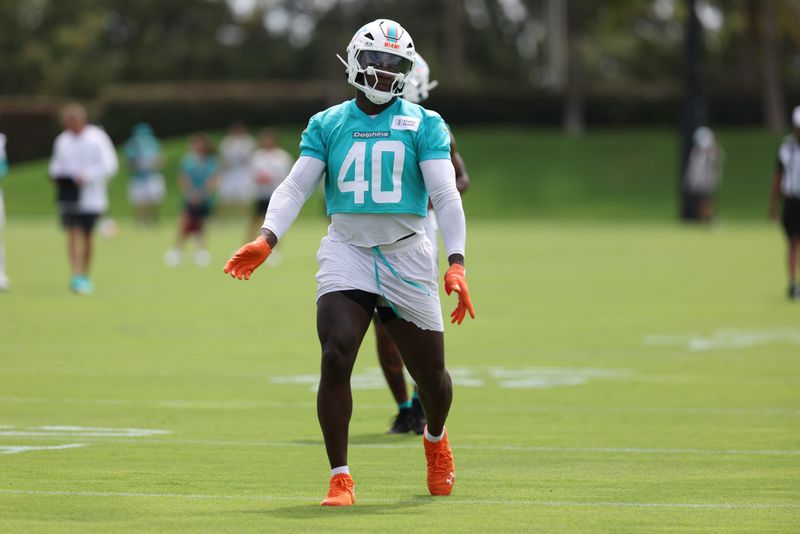 Jun 2, 2026; Miami Gardens, FL, USA; Miami Dolphins linebacker Willie Gay Jr. (40) doing drills at mini camp at Baptist Health Training Complex. Mandatory Credit: Isabella Frias-Imagn Images