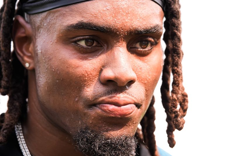 Sweat pours off the face of Jacksonville Jaguars Running Back LeQuint Allen (5) after the second day of NFL Training Camp at the Miller Electric Center on Thursday, July 30, 2026, in Jacksonville, Fla. [Doug Engle/Florida Times-Union]