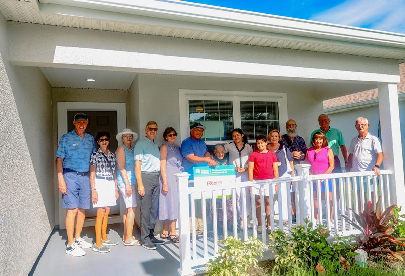 Bonita Bay residents joined Habitat homeowners Carlos and Maria for a home dedication.