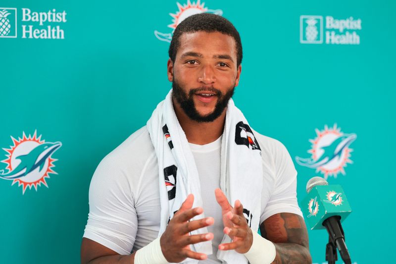 Jul 31, 2026; Miami Gardens, FL, USA; Miami Dolphins safety Dante Trader Jr. (11) speaks to reporters after practice at Baptist Health Training Complex. Mandatory Credit: Sam Navarro-Imagn Images