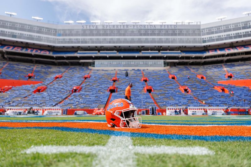 Oct 4, 2025; Gainesville, Florida, USA; A Florida Gators helmet sits on the 50 yard line before a game against the Texas Longhorns at Ben Hill Griffin Stadium. Mandatory Credit: Matt Pendleton-Imagn Images