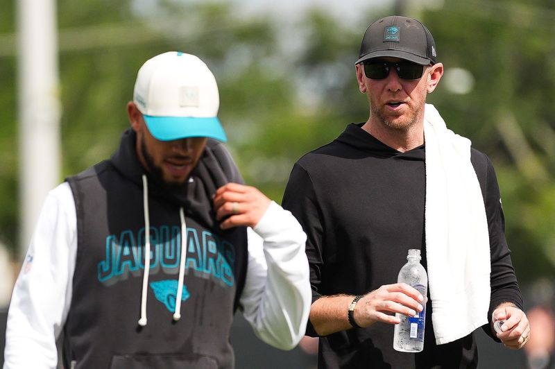 Jacksonville Jaguars Head Coach Liam Coen walks off the field after the fourth day of NFL Training Camp in shells at the Miller Electric Center on Thursday, July 30, 2026, in Jacksonville, Fla.  [Doug Engle/Florida Times-Union]