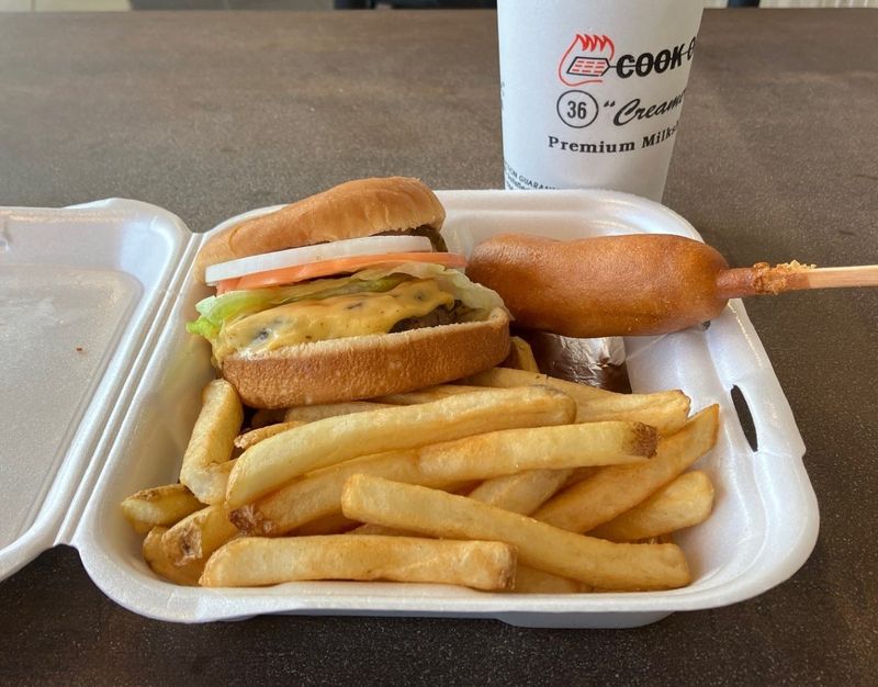 A regular-size Burger Tray with French fries, a corn dog and a drink is shown at the newly opened Cook Out at 14016 Beach Blvd.