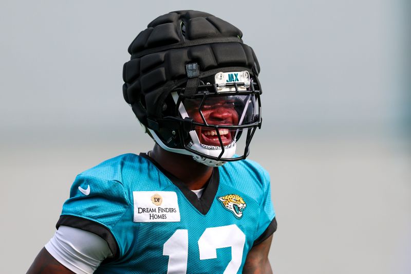 Aug 2, 2026; Jacksonville, FL, USA; Jacksonville Jaguars wide receiver Travis Hunter (12) participates in training camp at Miller Electric Center. Mandatory Credit: Nathan Ray Seebeck-Imagn Images