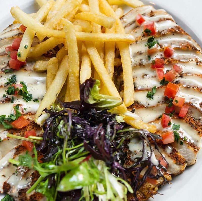 Cajun chicken is among the entrees in the rotation for a Wednesday's prix-fixe dinner special in August at Le Bilboquet in Palm Beach.