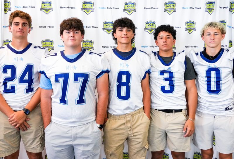 From left: Marco Island football players Zac Massie, Bryce Becker, Carter Good, Anthony Abin and Hutch Hamilton pose for a photo at the Naples Daily News in Naples, Fla., on Friday, July 31, 2026.