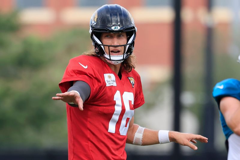 Jacksonville Jaguars quarterback Trevor Lawrence (16) directs a play during the sixth day of NFL training camp at the Miller Electric Center on Tuesday, Aug. 4, 2026, in Jacksonville, Fla.