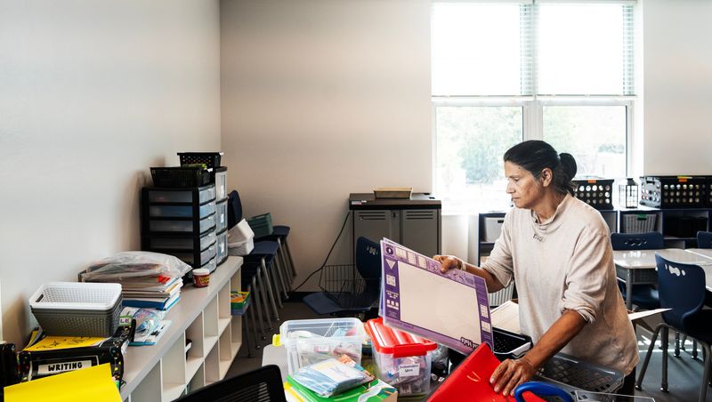 Maria Milian, a teacher at Bonita Springs Elementary School teacher prepares her new classroom for the upcoming school year on Tuesday, Aug. 4, 2026. The new school replaces the old school which was torn down. Renovations are still being made on the campus.