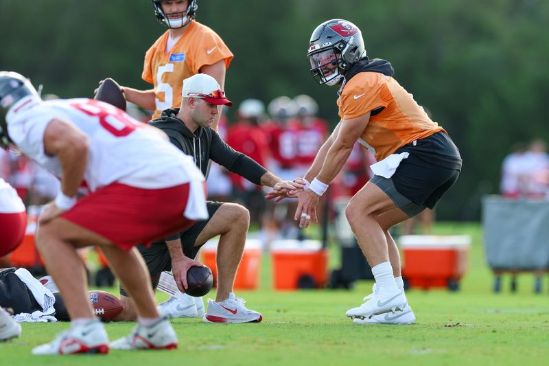 Jul 31, 2026; Tampa, FL, USA; Tampa Bay Buccaneers quarterback Baker Mayfield (6) participates in training camp at AdventHealth Training Center. Mandatory Credit: Nathan Ray Seebeck-Imagn Images