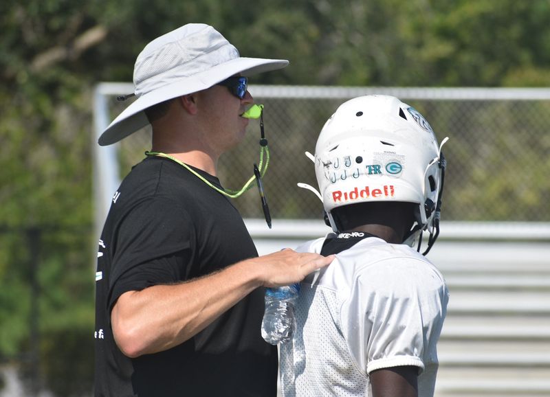 Destin Middle School Head Coach Shaun Arntz keeps a close eye on practice. This is his first year at the helm of the Marlins.