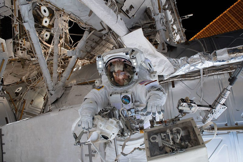 NASA astronaut Jessica Meir is pictured June 30 outside of the International Space Station during a seven-hour-and-20-minute spacewalk to replace a malfunctioning wrist joint on the Canadarm2 robotic arm.