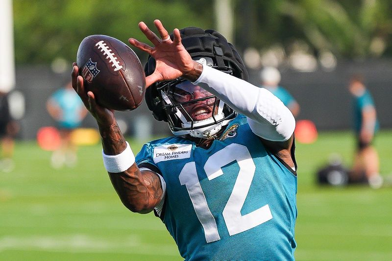 Jacksonville Jaguars Cornerback/Wide Receiver Travis Hunter (12) catches a ball during the Jacksonville Jaguars seventh day of NFL Training Camp at the Miller Electric Center in Jacksonville, Fla., Thursday August 6, 2026.    [Doug Engle/Florida Times-Union]