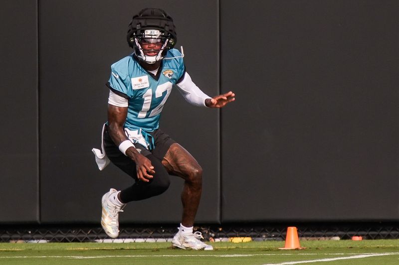 Jacksonville Jaguars Cornerback/Wide Receiver Travis Hunter (12) runs drills during the Jacksonville Jaguars seventh day of NFL Training Camp at the Miller Electric Center in Jacksonville, Fla., Thursday August 6, 2026.    [Doug Engle/Florida Times-Union]