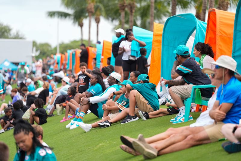 Fans watch the Miami Dolphins at training camp at Baptist Health Training Complex, Sunday, August 2, 2026 in Miami Gardens, FL.