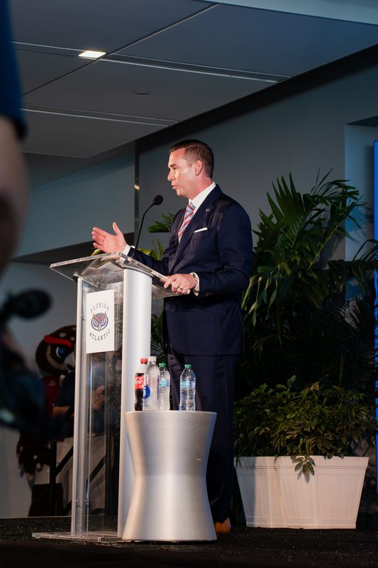 New Florida Atlantic University Vice President and Director of Athletics Josh McCowan speaks at his introductory press conference on August 7 in Boca Raton.