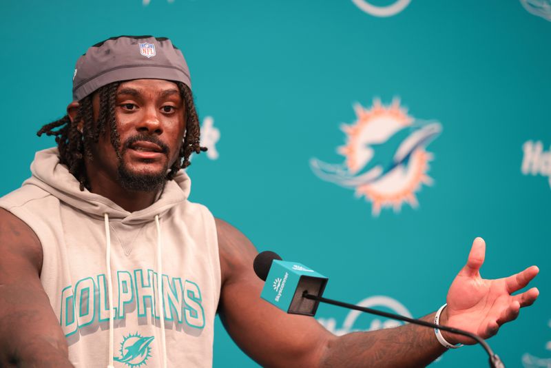 Aug 8, 2026; Miami Gardens, FL, USA; Miami Dolphins quarterback Malik Willis (2) speaks to reporters after practice at Hard Rock Stadium. Mandatory Credit: Sam Navarro-Imagn Images