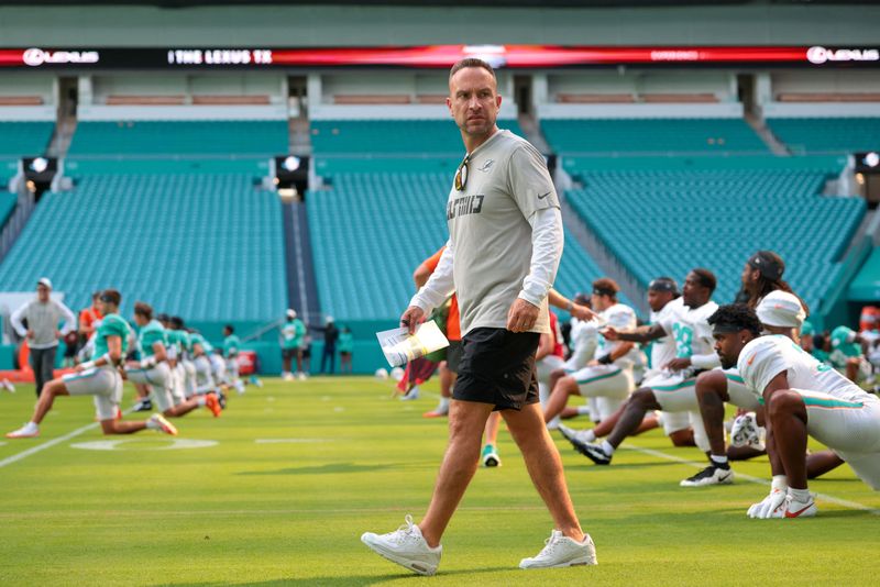 Aug 8, 2026; Miami Gardens, FL, USA; Miami Dolphins head coach Jeff Hafley walks on the field during practice at Hard Rock Stadium. Mandatory Credit: Sam Navarro-Imagn Images