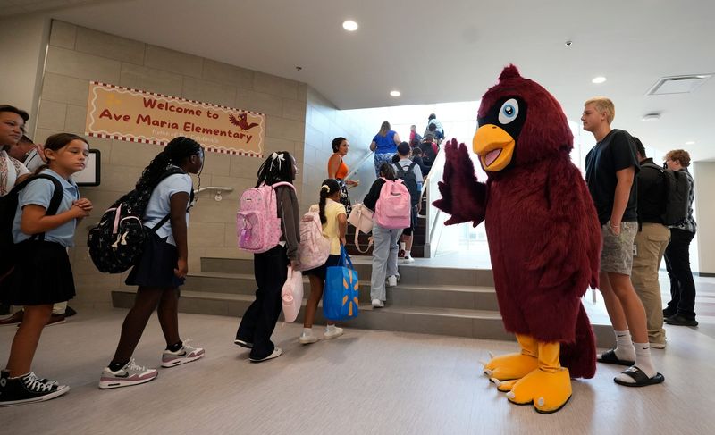 It was an emotional day for young students, family members and faculty attending Ave Maria Elementary School on its inaugural year Tuesday, Aug. 11, 2026.