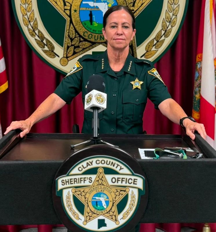 Clay County Sheriff Michelle Cook prepares to announce the arrest in a brazen attack on a woman out for a morning jog in Middleburg.