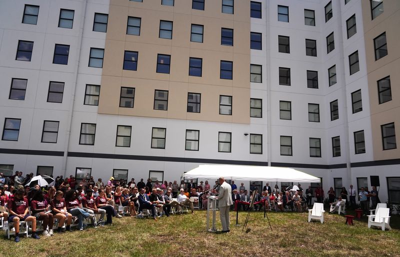 Florida Tech President John Nicklow talks about the new dorm at the ceremony. Florida Tech held a  ribbon cutting ceremony and tour of the new dorms on Wednesday, Aug. 12  for the new Crimson Crossing dormitory on the Floria Tech campus.