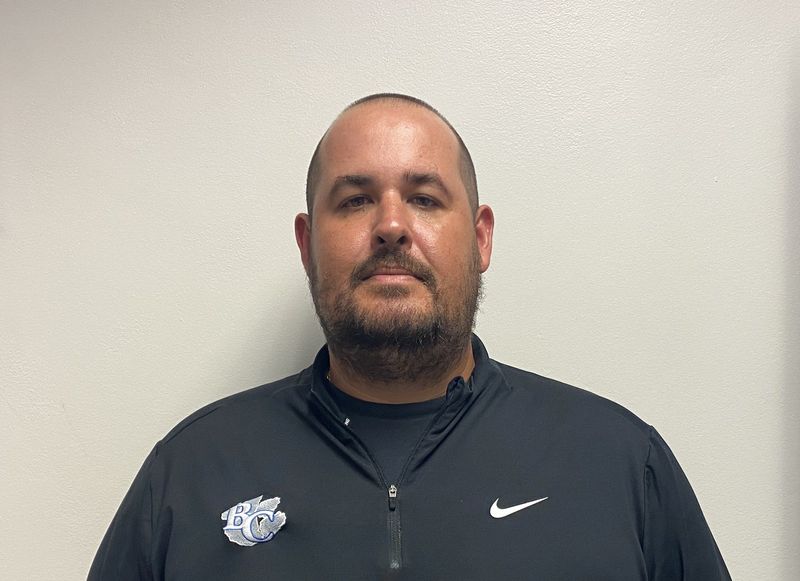 Andrew Clawson is the interim head coach of the Barron Collier football team for the 2026 season.