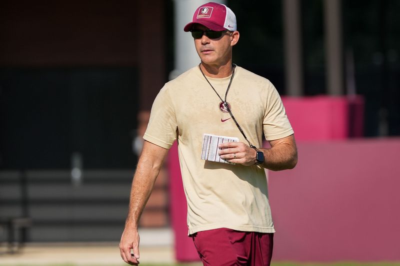 Florida State head coach Mike Norvell watches as players put in work during practice with the first home game just a few weeks away, Thursday, Aug. 13, 2026.
