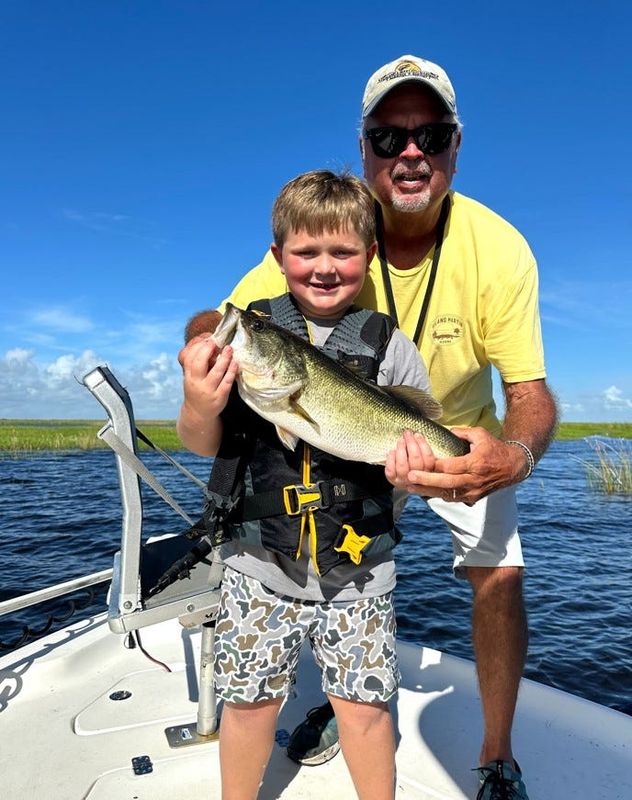 Capt. Bo White on Lake Okeechobee with a charter customer.
