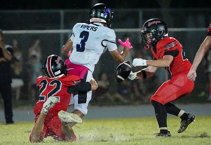 Liam Nolte of Ethan Sousa of Satellite force Space Coast ballcarrier Kadyn Thomas to fumble the ball in the fourth quarter of their first game of the season August 13, 2026. Craig Bailey, FLORIDA TODAY via USA TODAY NETWORK