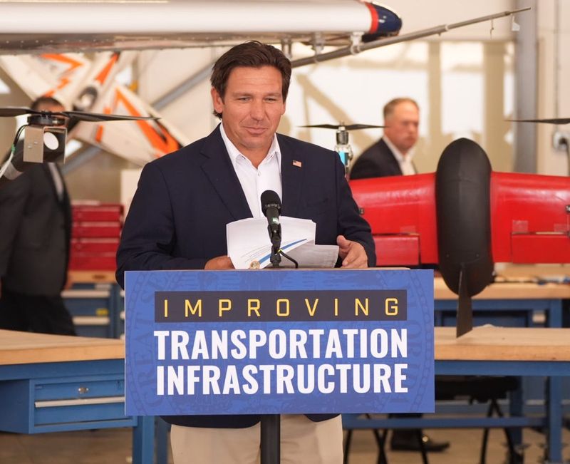 Gov. Ron DeSantis discusses forward-looking aviation technologies during a news conference at the Embry-Riddle Aeronautical University Center for Advanced Air Mobility in Daytona Beach, Aug. 14, 2026.