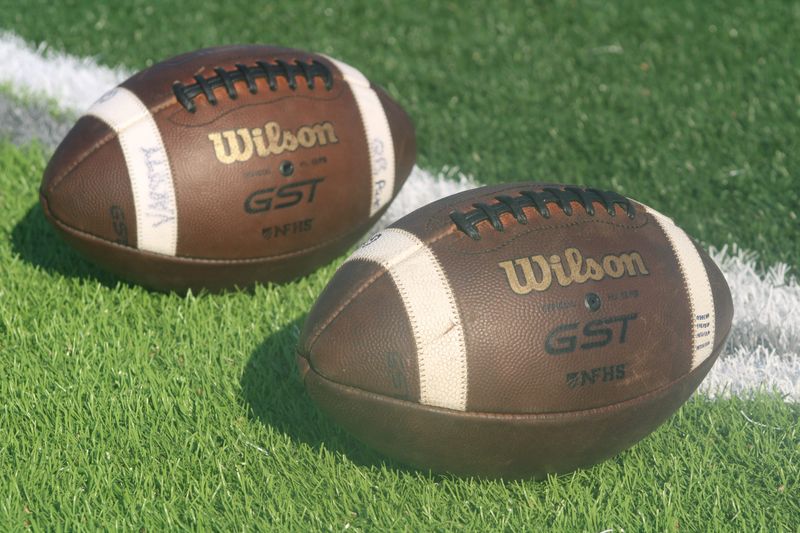 STOCK | Footballs are pictured on the turf field during a high school football preseason kickoff classic between Ed White and Nease on Aug. 13, 2026, in Ponte Vedra Beach, Florida. [Clayton Freeman/Florida Times-Union]