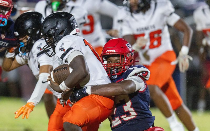 Vanguard Timothy Swinton (23) stops Hawthorne  Derryek Gillins (10) during a preseason football game at Booster Stadium in Ocala, FL on Friday, August 14, 2026. [Alan Youngblood/Gainesville Sun]