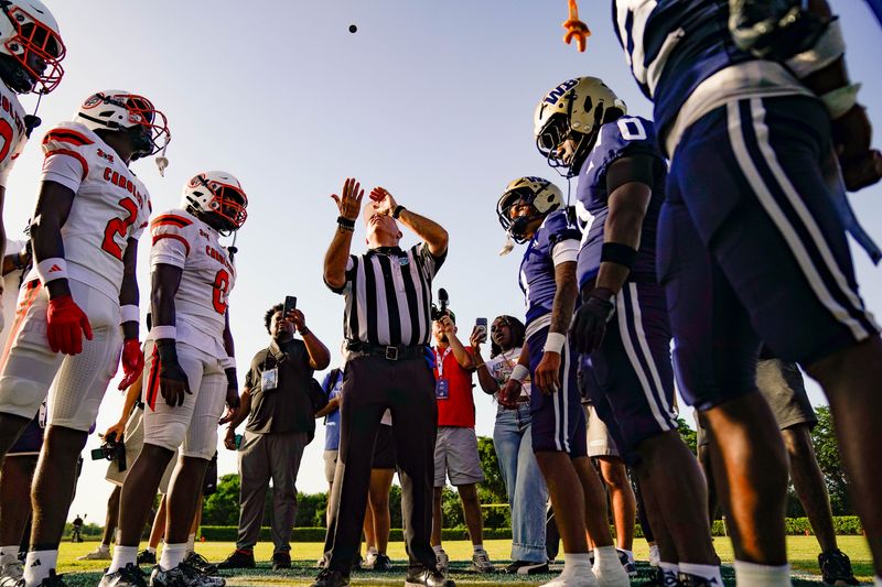 Carol City and West Boca await the coin toss on Aug. 14, 2026, in Boca Raton, FL.