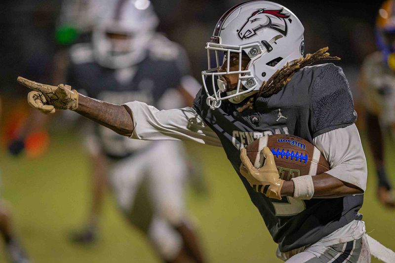Jayvontay Louis calls for a blocker on a run as the Class 6A Palm Beach Central High School Broncos hosted the Class 3A Miami Northwestern Senior High School Bulls in preseason varsity football at the school in Wellington, Fla., on August 14, 2026. The Bulls won 30-19.