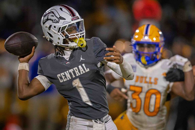 Isaiah Hamilton (1) looks to pass as the Class 6A Palm Beach Central High School Broncos hosted the Class 3A Miami Northwestern Senior High School Bulls in preseason varsity football at the school in Wellington, Fla., on August 14, 2026. The Bulls won 30-19.