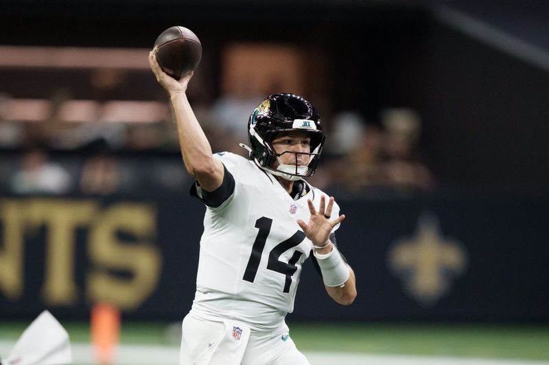Aug 15, 2026; New Orleans, Louisiana, USA; Jacksonville Jaguars quarterback Nick Mullens (14) throws against the New Orleans Saints during the first quarter at Caesars Superdome. Mandatory Credit: Matthew Hinton-Imagn Images