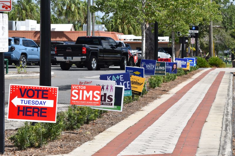 Election signs outside the polling place at the Lake Mirror Center in Lakeland on primary day, Aug. 18, 2026.