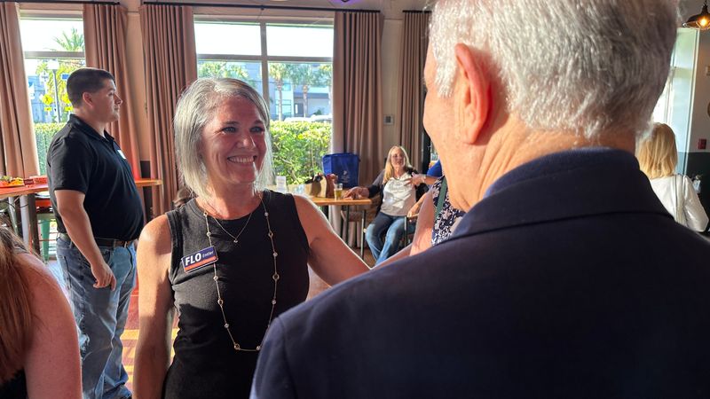 City of Sarasota Commission at-large candidate Flo Entler greets supporters at Tamiami Tap in Sarasota on Primary Day evening, Tuesday, Aug. 18, 2026.