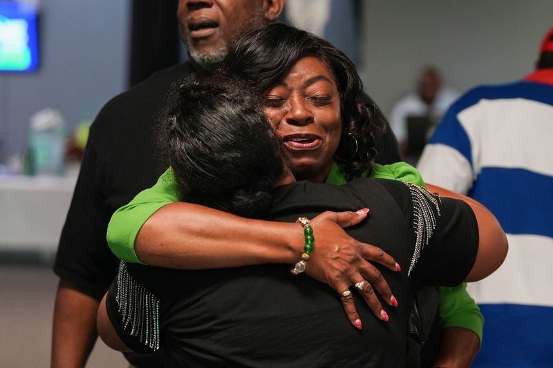 City Commission Seat 5 incumbent Dianne Williams-Cox hugs a supporter after arriving to her watch party at Tallahassee Nights Live on Tuesday, Aug. 18, 2026.