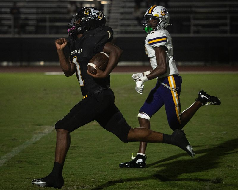 Rutherford's Jamarion Blount (1) races for an 80-yard score against Union County at Tommy Oliver Stadium in Panama City, Florida, August 21, 2026. Union County would hold on to win the game 35-34. (Tyler Orsburn/Panama City News Herald)