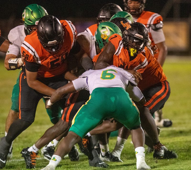 DeLand tackles Lake Wales running back Kamari Smith (7) on Aug. 21, 2026.